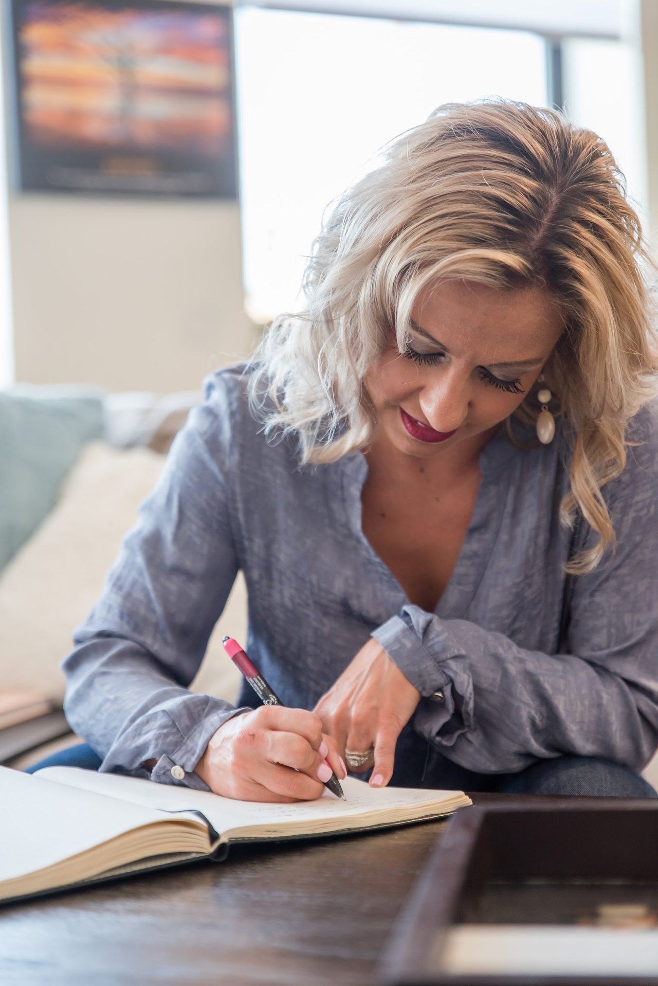Krystalore Crews journaling her daily reflection