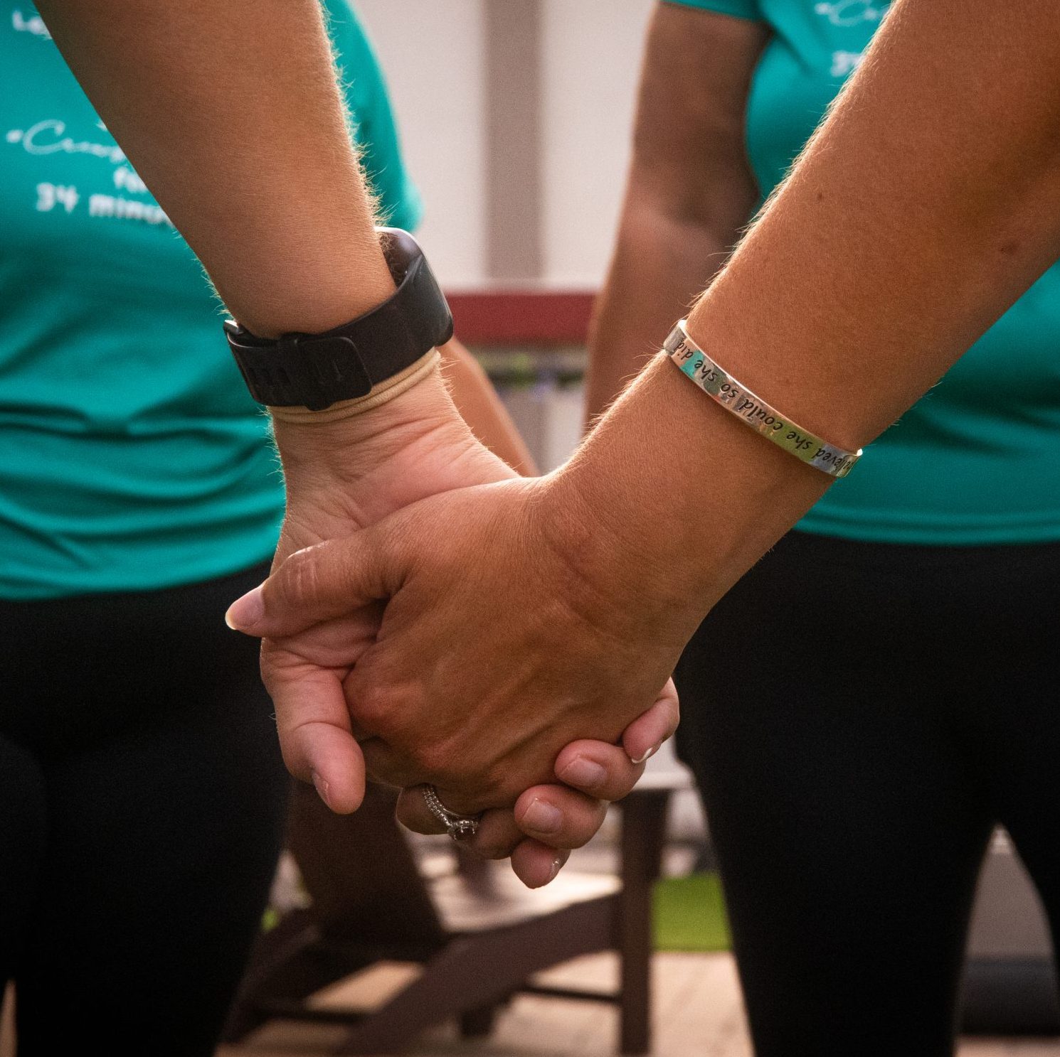 Community unity and hands together in support