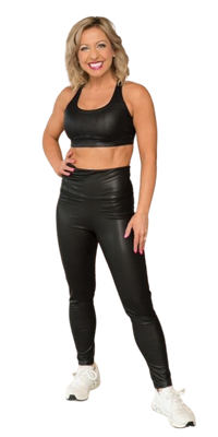 Krystalore Crews full body athletic portrait in black outfit with white sneakers